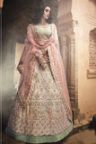 Fabulous Pista Green Colored Party Wear Lehenga Choli With Thread, Zari, Ruffle Work