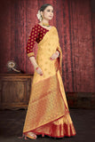 Party Wear Beige Color Raw Silk Saree With Red Unstitched Blouse