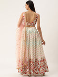 white hues embellished in sequins and thread floral work Lahenga Choli