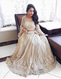 Desirable Light Brown Colored Partywear Embroidered Soft Net Lehenga Choli