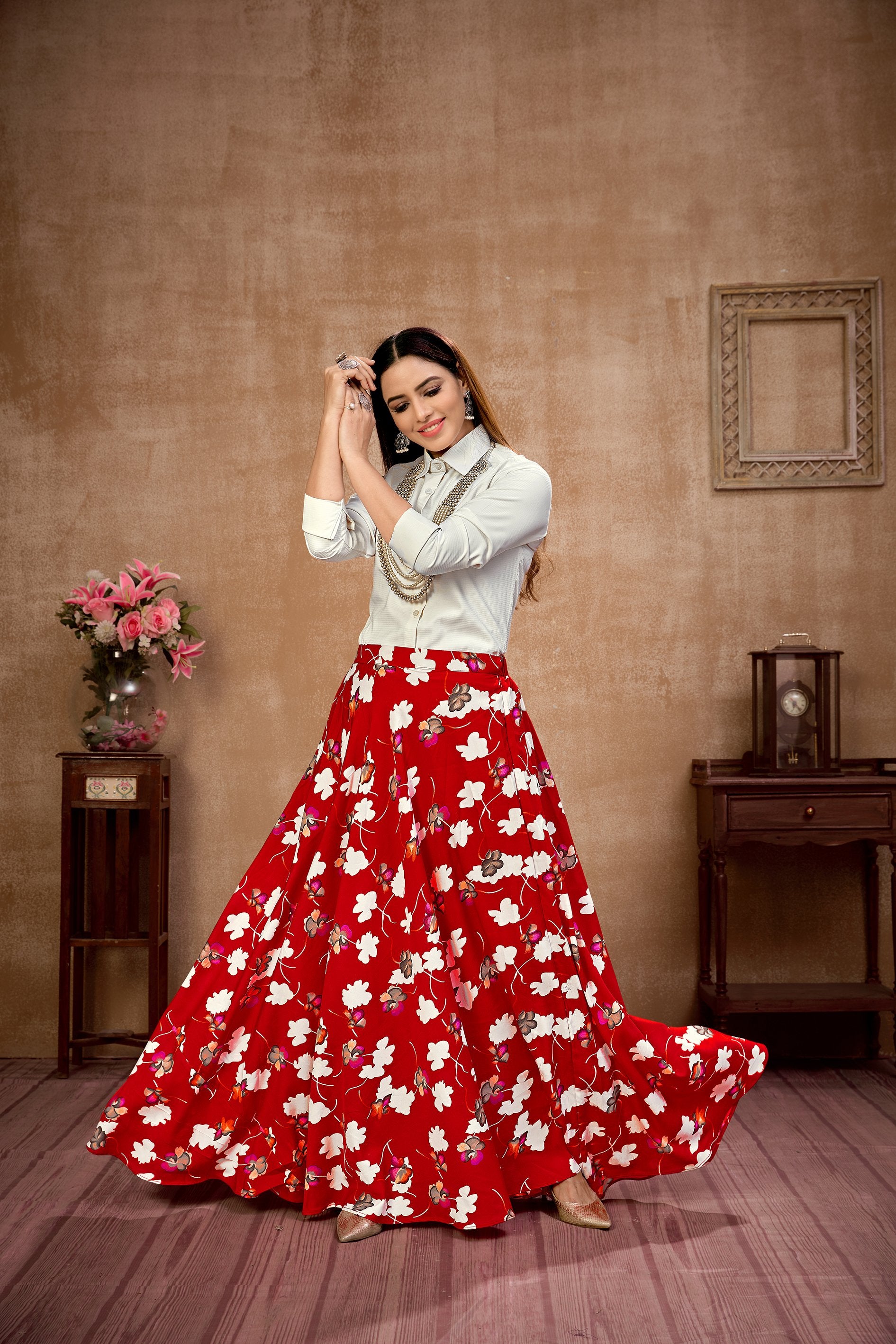 Dazzling White Top With Red Floral Printed Skirt For Party Wear
