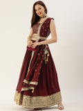 Create your special look more completely by enrobing this elegant maroon color lehengacholi