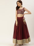 Create your special look more completely by enrobing this elegant maroon color lehengacholi