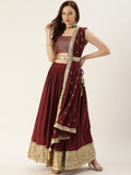 Create your special look more completely by enrobing this elegant maroon color lehengacholi