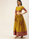 A designer outfit in unique colours and zari work Lahenga Choli