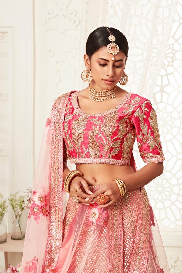 FRESH PINK TWO TONED LEHENGA SET WITH ALL OVER GOLD BUTIS AND A SEQUIN WORK  BLOUSE PAIRED WITH A MATCHING DUPATTA AND PALE GOLD DETAILS. - Seasons India