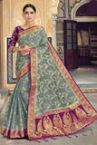 Raw Silk Party Wear Saree With Woven Work