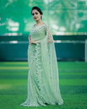 A Gratifying Heavy Embroidery Pearl Work Mint Green Saree With Classy Blouse