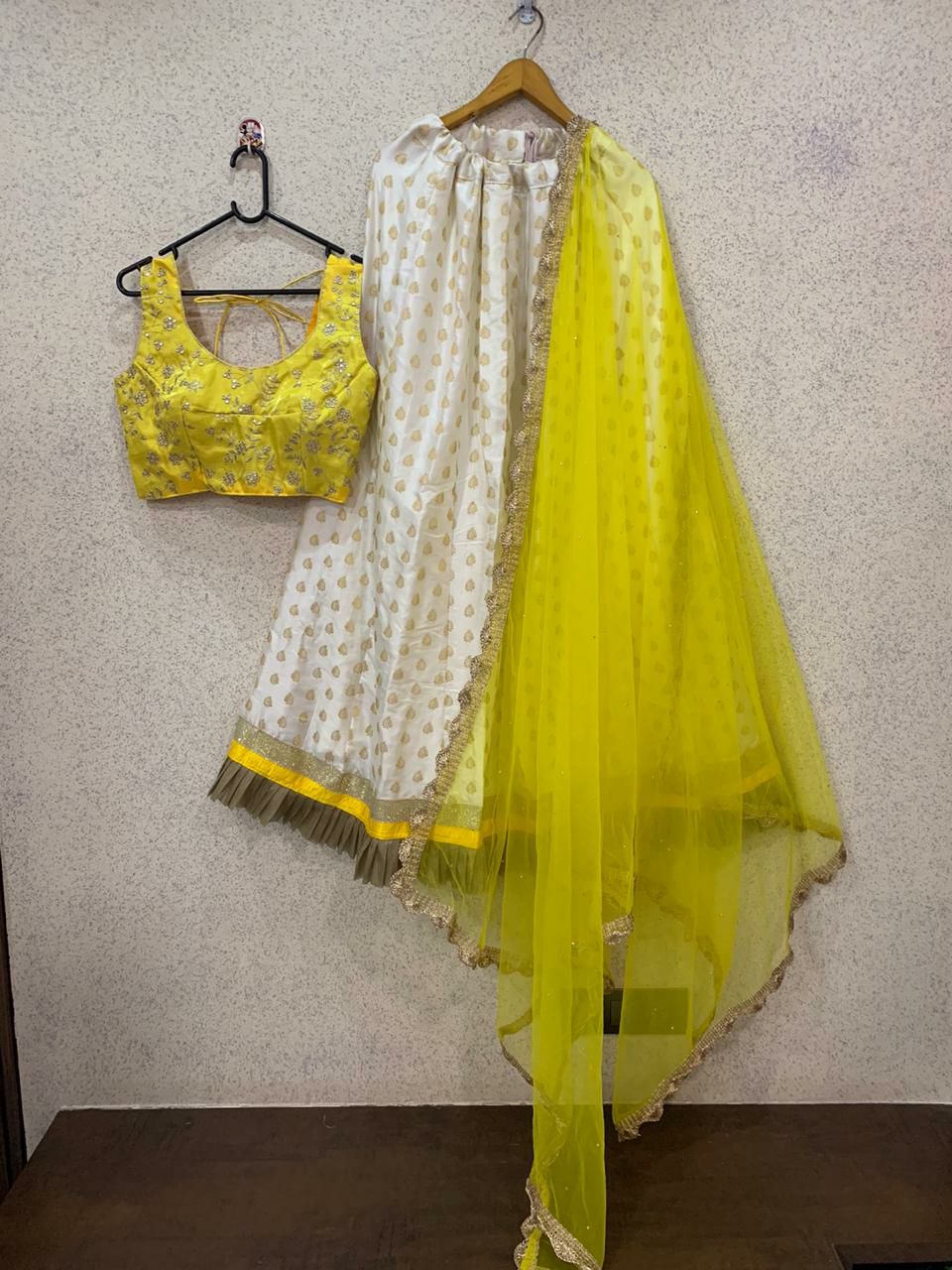 Glowing White-Yellow Colored Party Wear Foil Print Silk Lehenga Choli