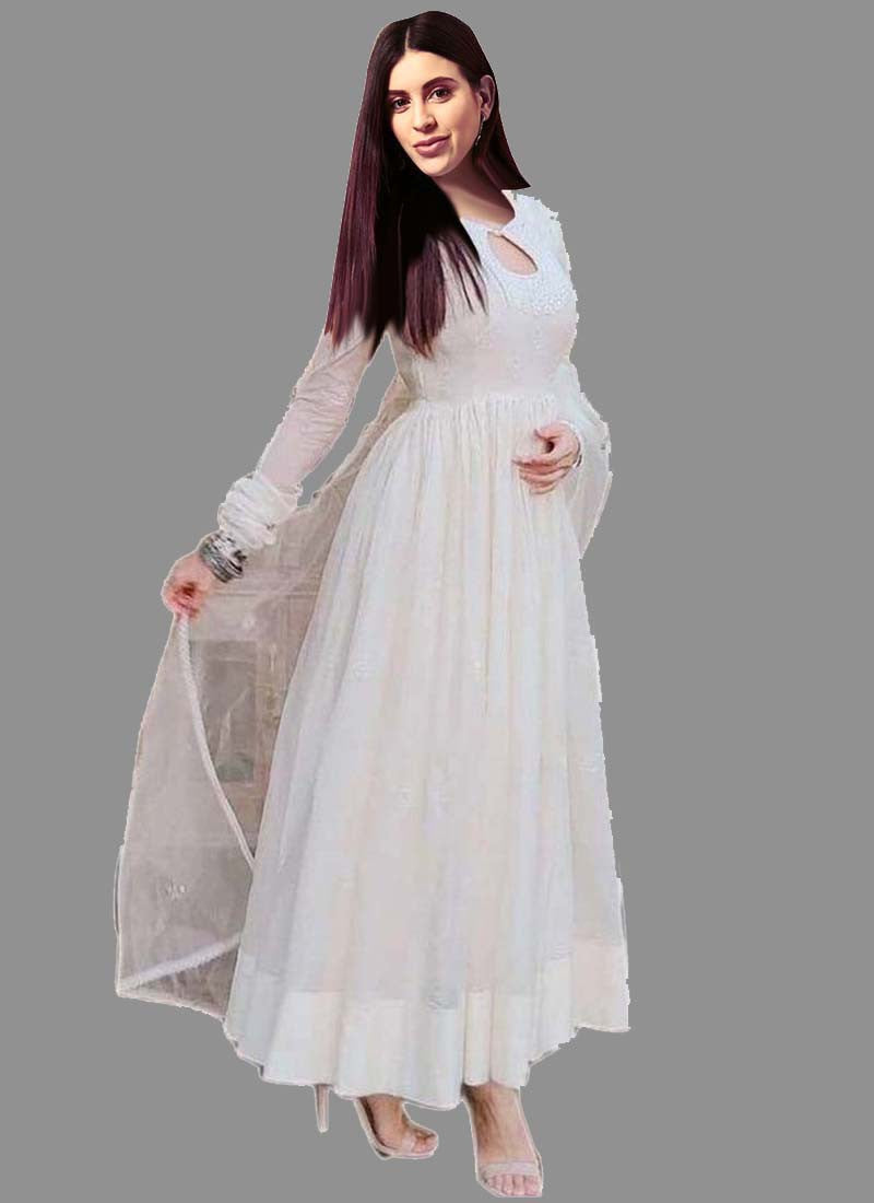 IVORY WHITE CHIKAN ANARKALI GOWN SET WITH A HAND EMBROIDERED BODICE PAIRED  WITH A CONTRAST RED BANDHEJ DUPATTA AND ALL OVER SILVER DETAILS  Seasons  India
