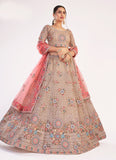 Beige Color Soft Net Fabric Heavy Work Lehenga With Net Dupatta