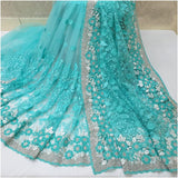 Imposing Sky Blue Colored Nylon Net With Heavy Embroidered Work Saree