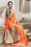 Orange Colored Raw Silk Saree With Zari Woven Work