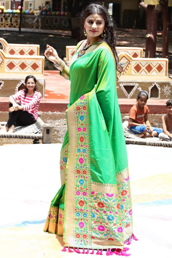 Green Color Floral Woven On Border Jacquard Silk Saree For Women