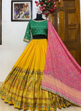 Delightful Yellow Color Soft Net Base Heavy Thread And Sequins Work Lehenga Choli